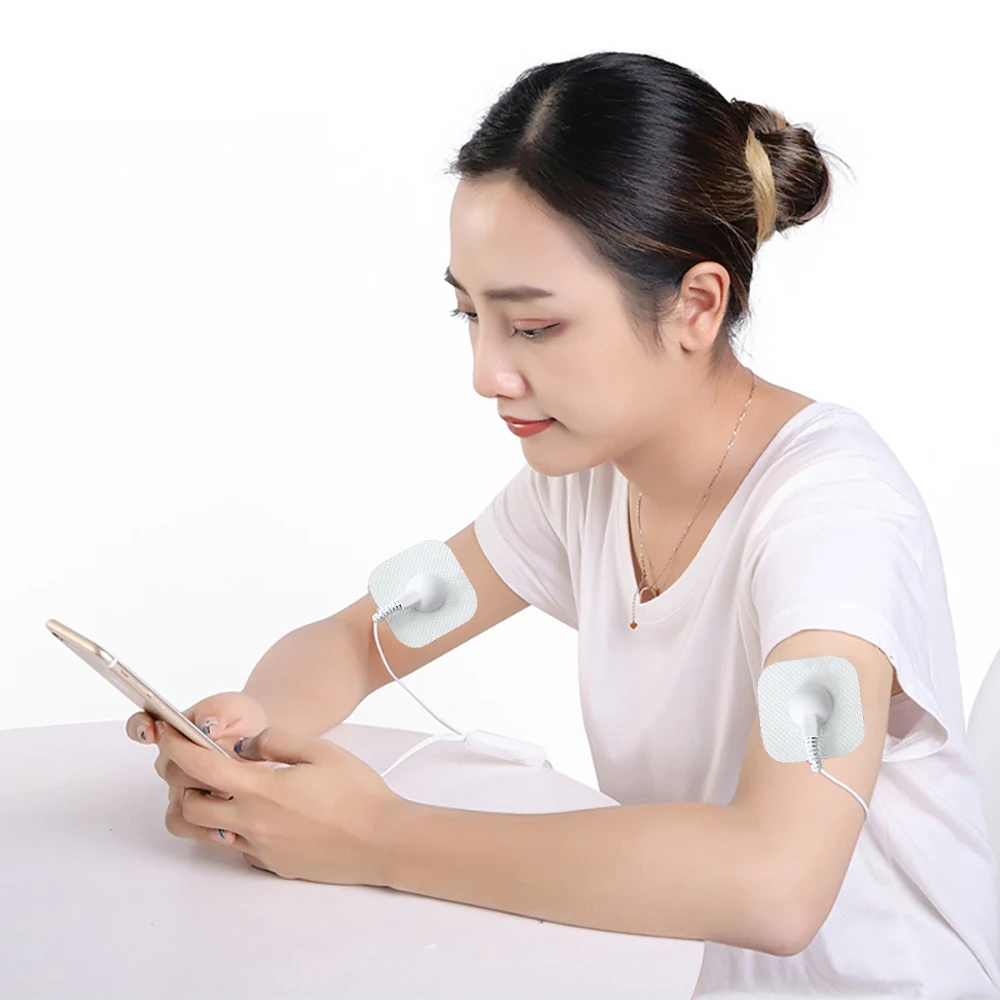 الهاتف المتصل المحمولة عشرات صغيرة الهاتف المحمول التحكم نبض الجسم مدلك EMS محفز العضلات آلة العلاج بالوخز بالإبر