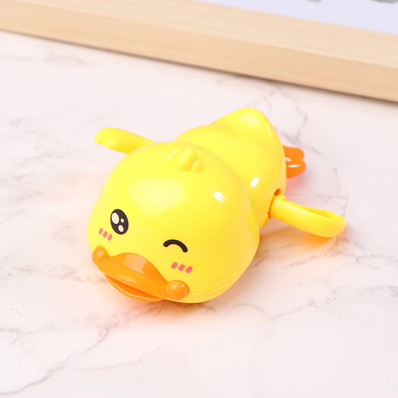 

Baby Bath Toys Water Chain Clockwork Bathing Cute Swimming Yellow Duck Toy Toddler Pool Beach Classic Toy For Kids Water Playing