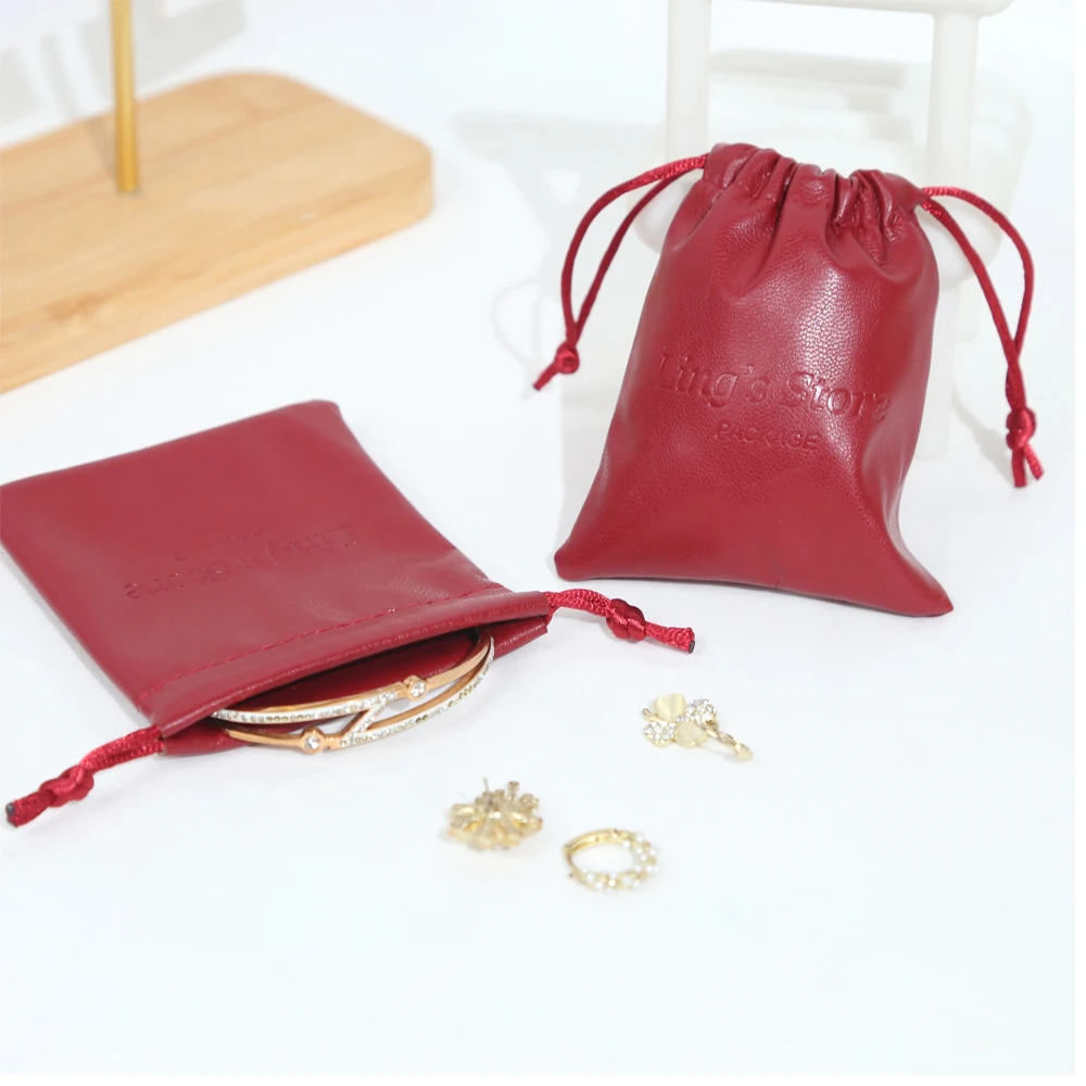50/100 шт. шикарные индивидуальные ювелирные изделия из искусственной кожи, сумка на шнурке, подарочная упаковка, сумки для сережек, косметический органайзер для париков, карман для хранения