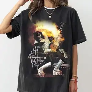 RIP Ace Frehley 2025 قميص رائد فضاء روك آند رول ليجند تحية قبلة الفرقة الموسيقى المشجعين خمر نمط للجنسين تي شيرت الراحة في السلطة