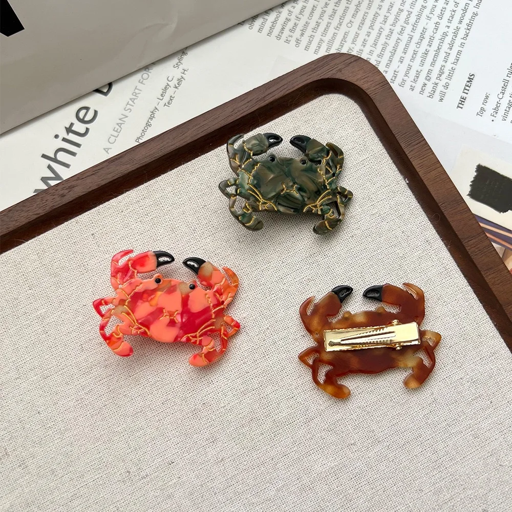 Крабовый коготь представляет собой нишевый и уникальный стиль летнего отдыха. Это изготовлен из высококачественного ацетатного материала, изготовленного вручную, с эмблемой.