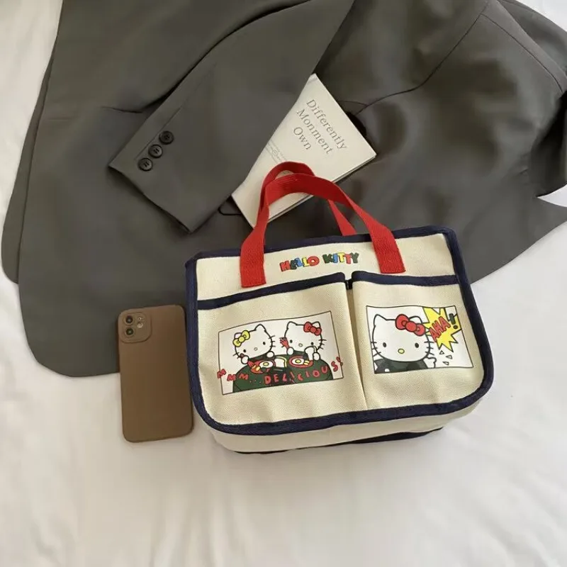 

Hello Kitty Makeup Bag Cute Printed Women Accessories Large Capacity Versatile KT Handheld Commuter Kawaii Girl Gift Wholesale