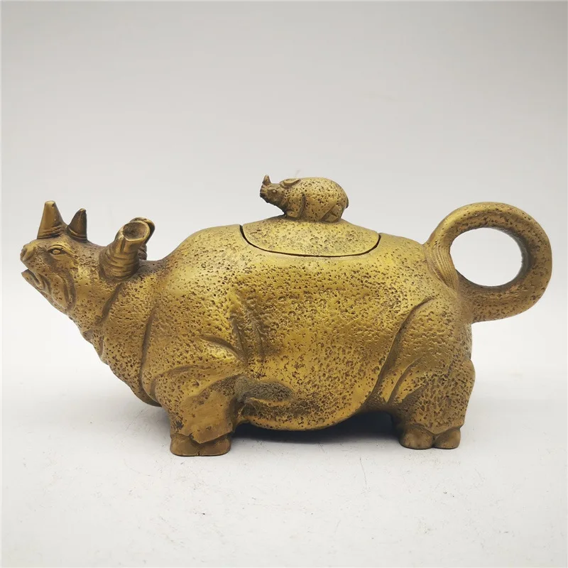 Antiqued rhino , brass , wine pot, teapot, decorative piece for living room and study