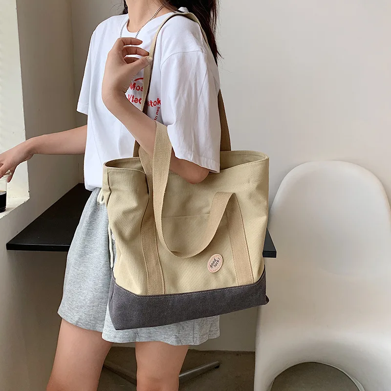 Bolsa de ombro feminina em lona versão coreana, bolsas e bolsas novas, casual, cores misturadas, bolso aberto, alta capacidade, 2023