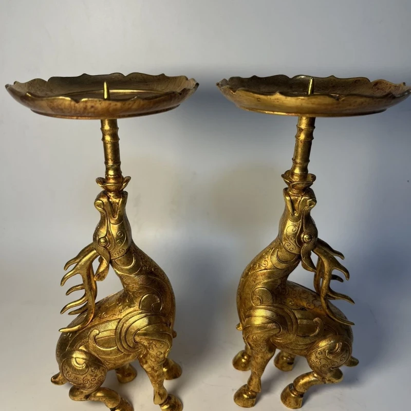 

Antique brass candlestick, crane, elephant ornament, a pair of craft home furnishings