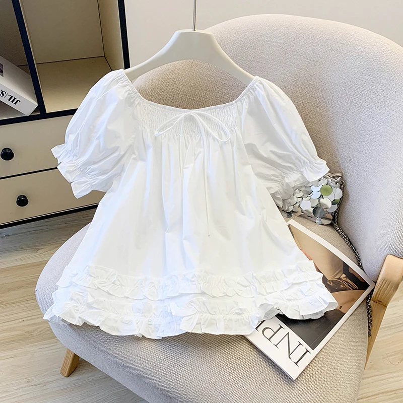 

Новая женская летняя блузка в нежном стиле с белыми рукавами-фонариками, коротким рукавом, декоративным узлом и волнистым краем, для повседневной носки.