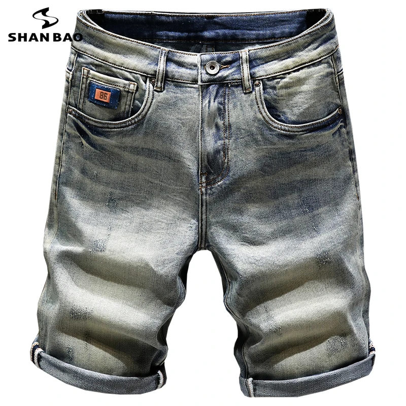

SHAN BAO 2026 Summer High Quality Brand Clothing Mustache Effect Badge Men's Fit Straight Cotton Stretch Denim Shorts Distressed