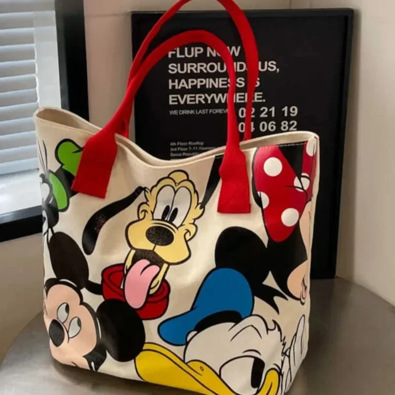 漫画ミッキーファッション多用途大容量キャンバスショルダーバッグ女性のカジュアル多用途トートバッグ学生クラスのハンドバッグ