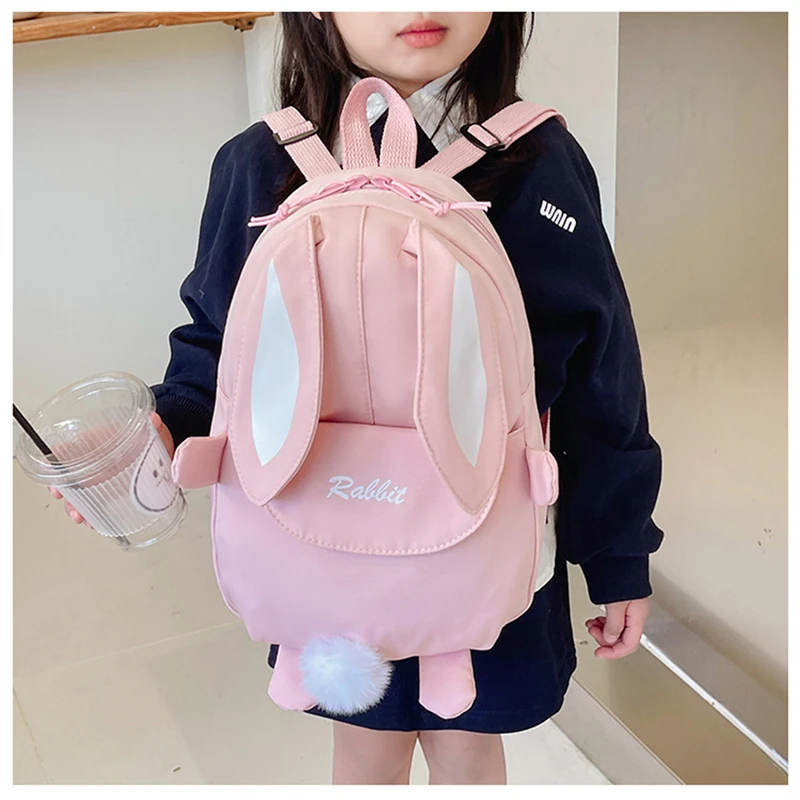 

Personalised Kawaii Bunny Backpack for Girls with Cute Rabbit Ears and Fluffy Bear Pendant School Bookbag for Kids