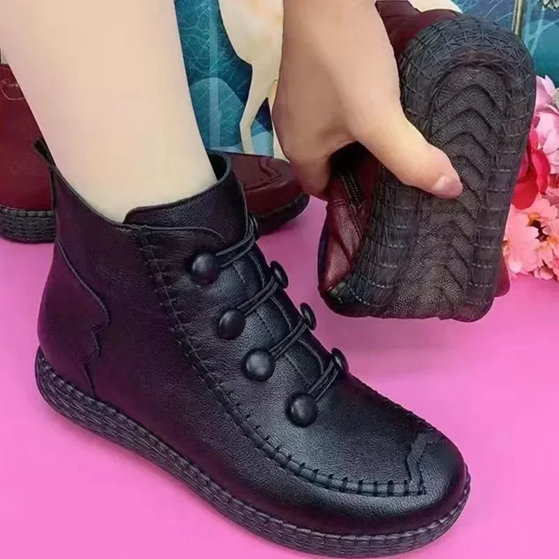 Botas de nieve cortas antideslizantes gruesas para mujer, zapatos cálidos de algodón para madre, botines de fondo suave, Invierno