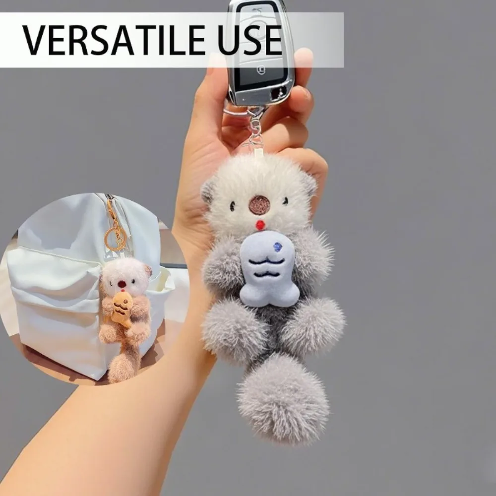 Cute‑Style Otter Plush Keychain Holding Fish - Soft Plush with Exquisite Stylized Design, Adorable Trendy Toy Aesthetic - Bag Charm Decor Accessory To Add A Playful Vibe