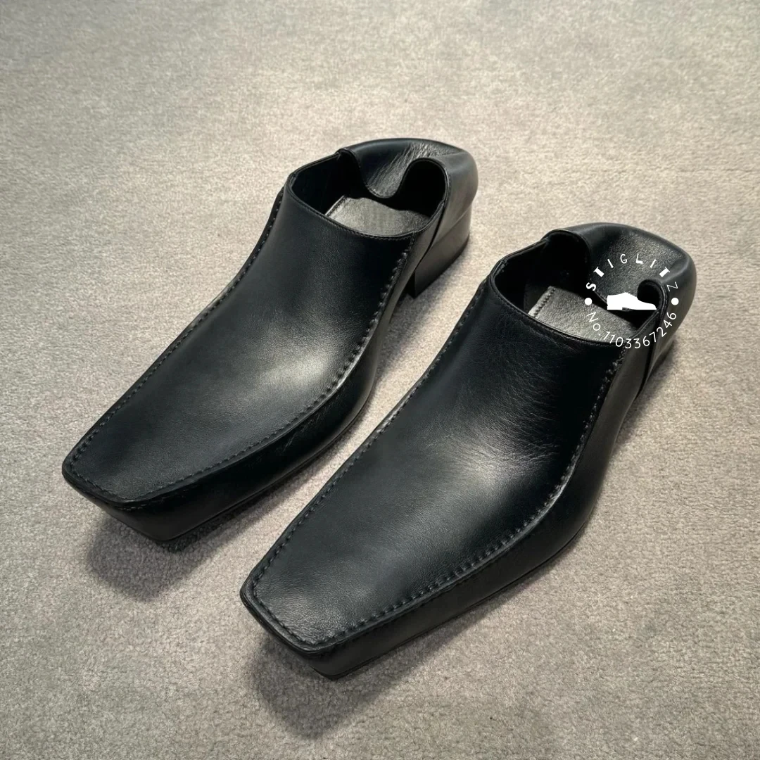 Mocasines de punta cuadrada alargados de diseñador novedoso para hombres, zapatos suaves de cuero negro, zapatillas de último diseño, zapatos sin cordones exagerados