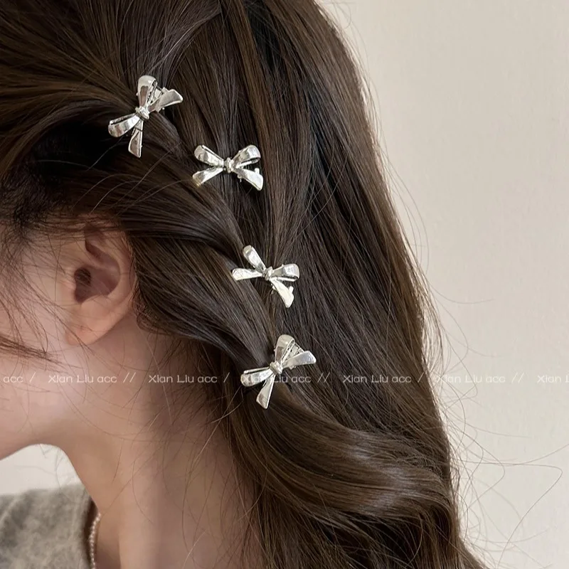 

Sweet and cool bow metal small hairpin female side ear clip broken hair