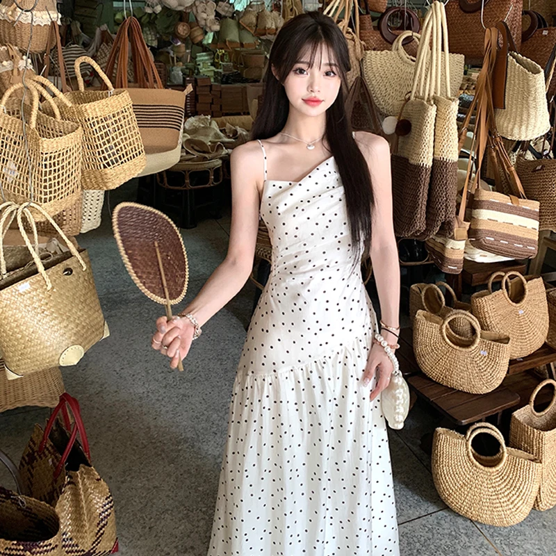 

polka dot slanted shoulder camisole dress for women in summer,sweet girl new dress, high-end atmosphere, and long skirt trend