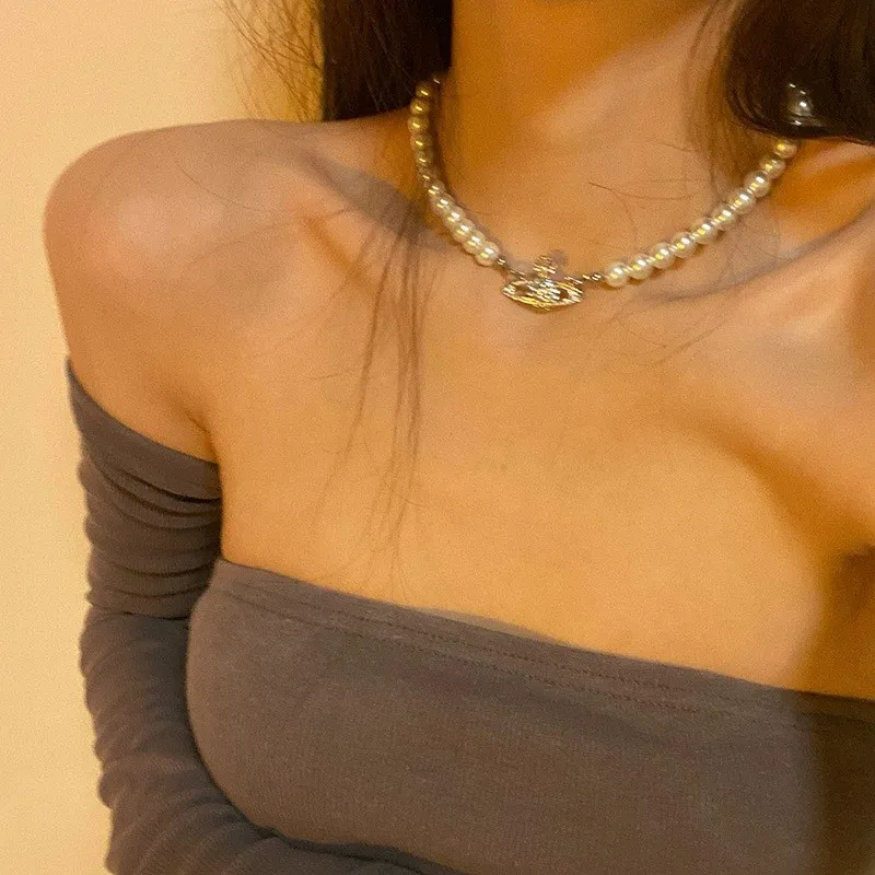 

Жемчужное колье-чокер для женщин, легкий люкс, нишевый дизайн, цепочка на ключицу в форме сердца, высококачественная цепочка для свитера, элегантный стиль