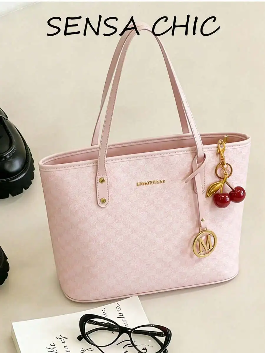 This Fashionable New Shoulder Bag Is Made Of Waterproof PU Material, Decorated With Letter Patterns And Cherry Pendants. It Is A