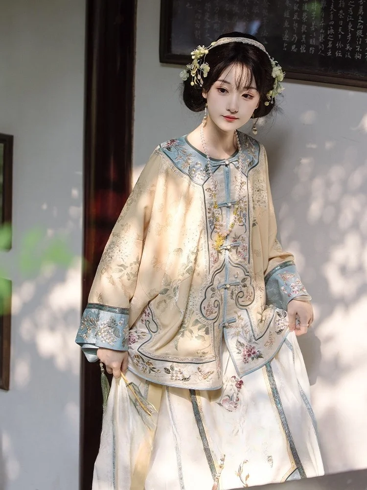 

A Chinese-style restoration wide-sleeved top with heavy embroidery and skirt set