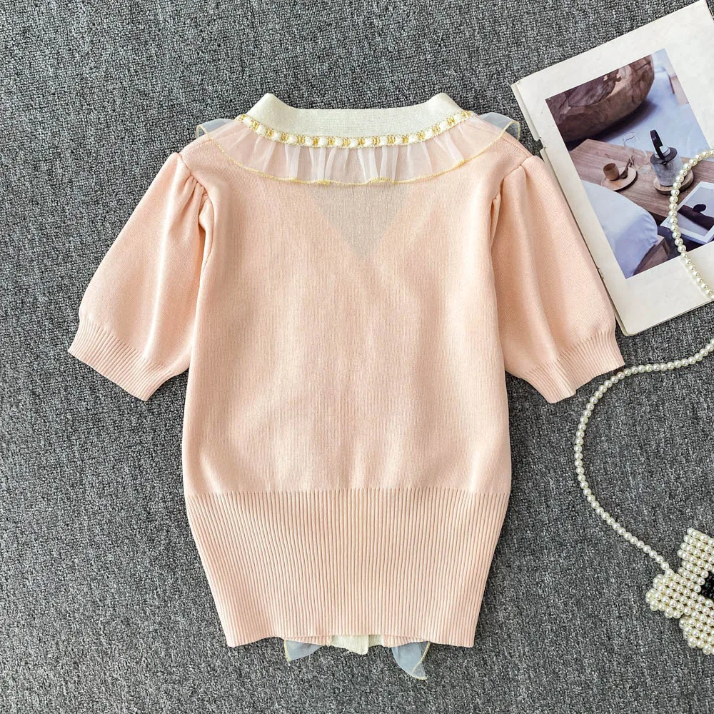 Słodki kontrastowy kolorowy T-shirt z dzianiny dla kobiet Wszechstronna moda V-Neck Single Breasted Slim Tops Kobiece koszulki retro