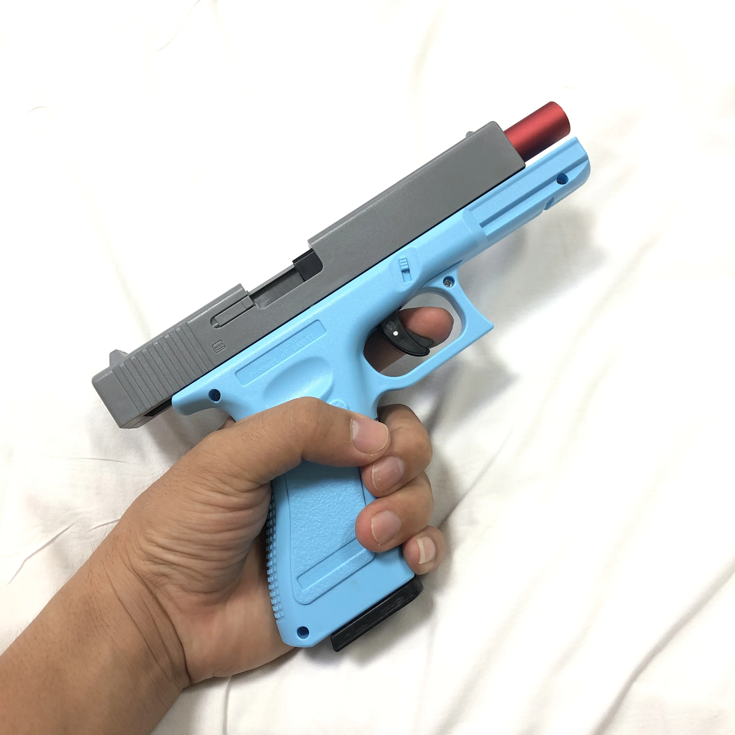 Dual-Mode ปืนของเล่น G17 เลเซอร์รุ่นอัตโนมัติยิงหัวไชเท้าปืน SHELL Ejection Soft Bullet ปืนพก CS อาวุธสําหรับเด็ก