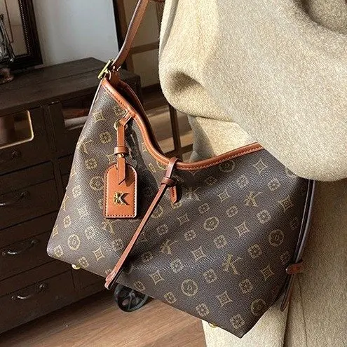 

Минималистичная элегантная роскошная винтажная сумка для подгузников для женщин, большая вместительная кожаная сумка через плечо, уникальная дизайнерская сумка-кроссбоди, модная сумка-тоут.