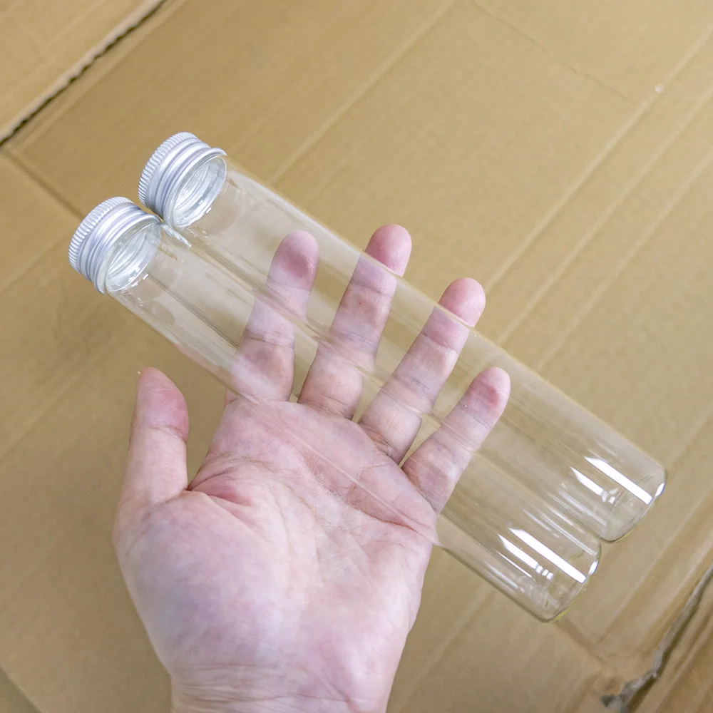 

12PCS/Lot 30*180mm 100ml Tiny Transparent Glass Bottles with Silver Aluminium Screw Cap Cute Jar Vials DIY Craft