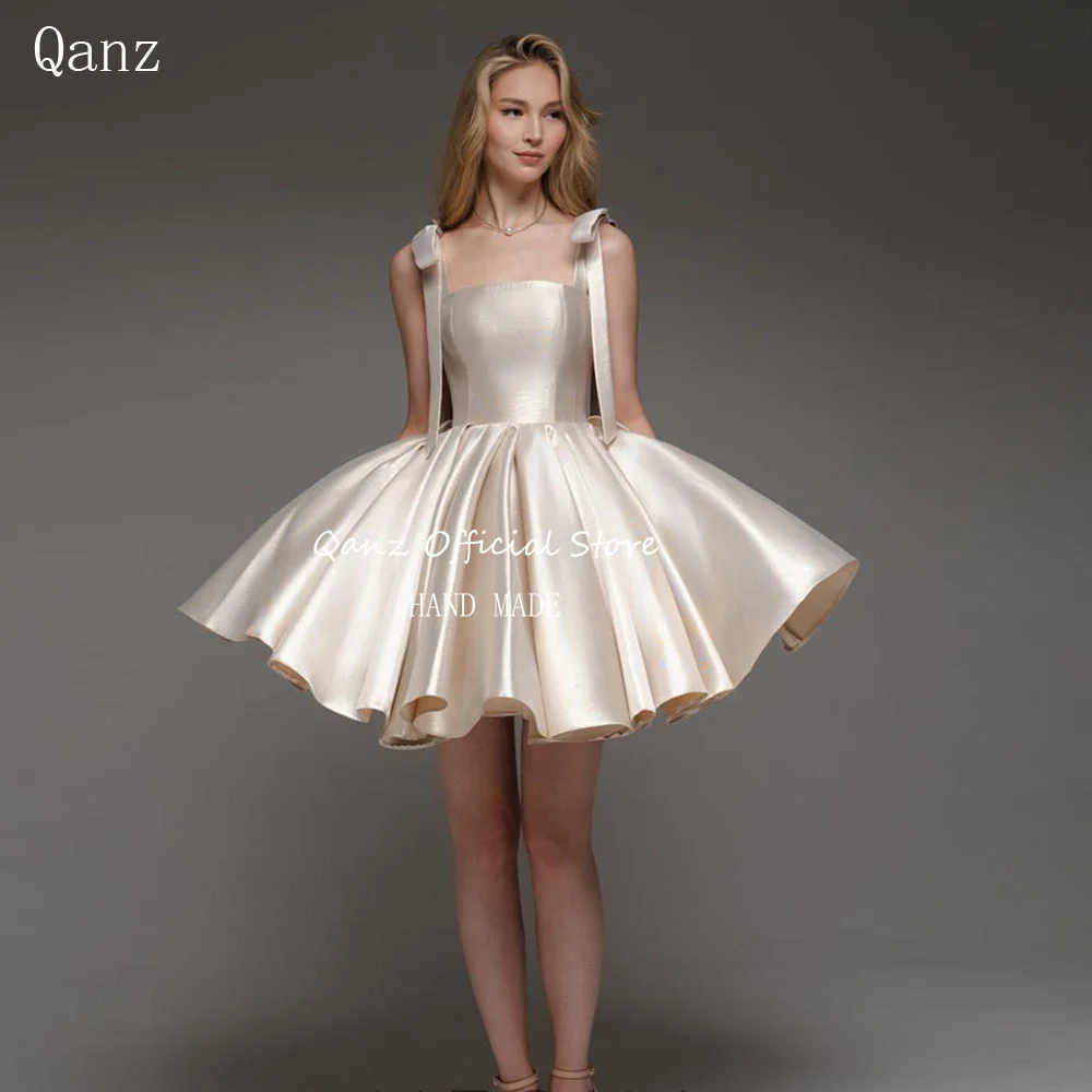 

Qanz Short A Line Vestidos De Graduación Spaghetti Straps Champagne Satin Prom Dresses Lace Up Back Cocktail Gown Party Gowns