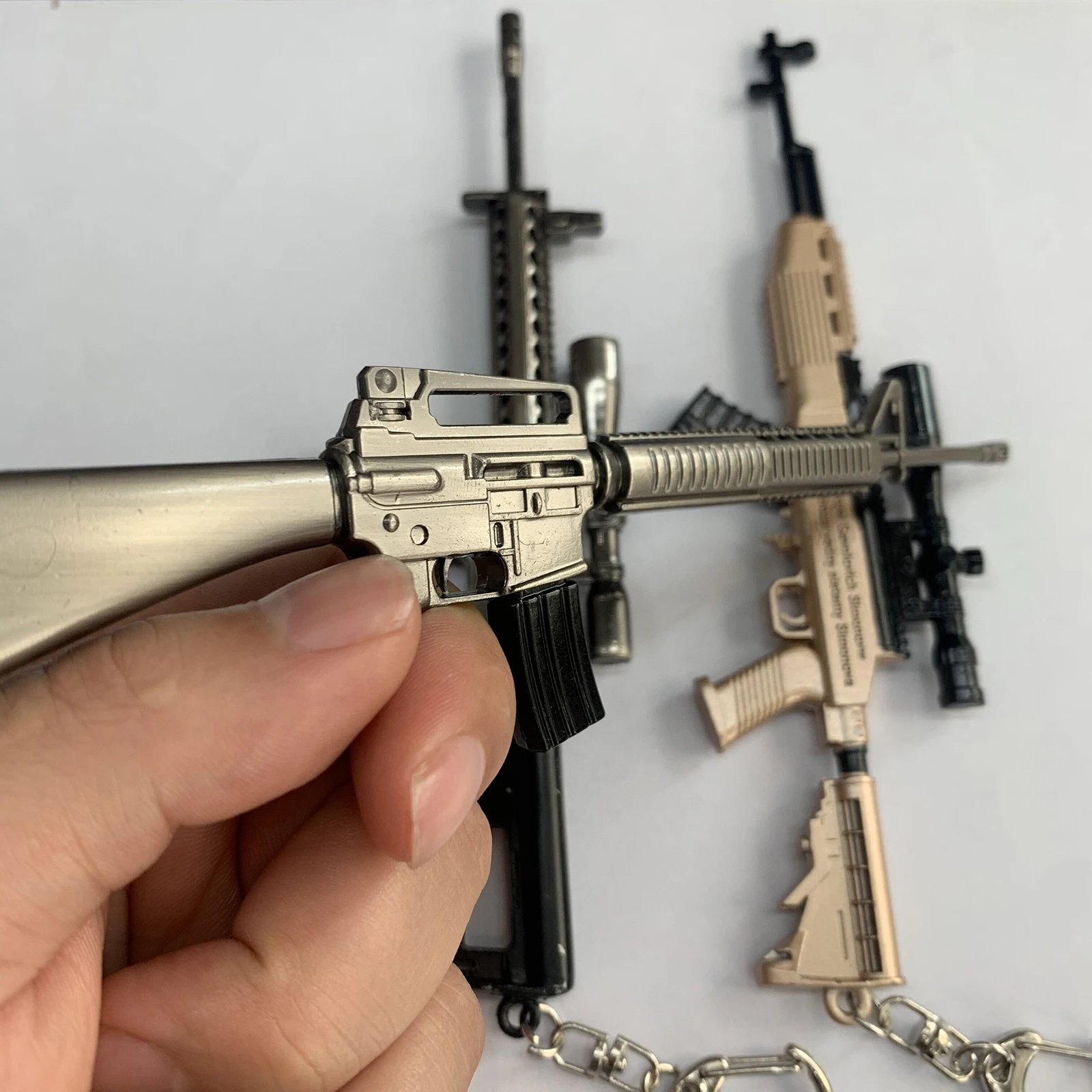 Mini llavero de pistolas M416 M4A1 para hombres, baratija de Rifle, llaveros de francotirador, joyería Punk, regalo de recuerdos, novedad