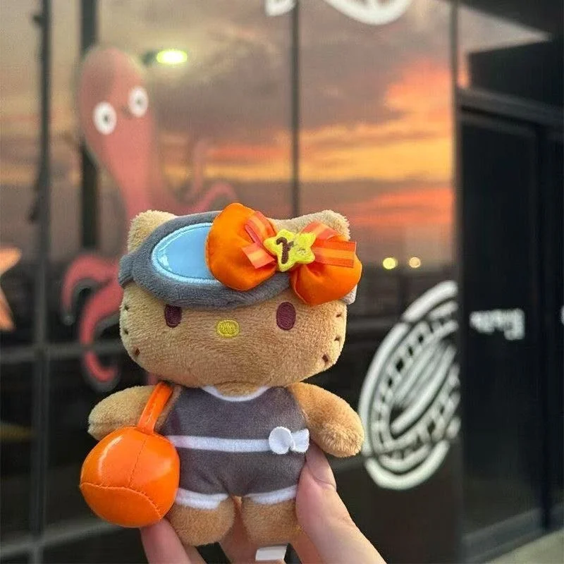 พวงกุญแจตุ๊กตาการ์ตูนซานริโอ้ใหม่ ตุ๊กตาขนนุ่มสีดำ Hello Kitty ตุ๊กตาขนนุ่มเจจูแว่นตาสีส้มโบว์สีส้ม KT cat อุปกรณ์เสริมกระเป๋า