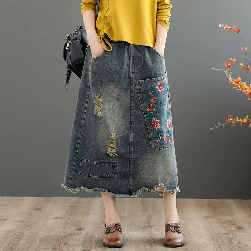 

Female Vintage Long Mid-Calf A-Line Women Elastic Waist Casual Denim Skirt Embroidery Holes Retro Printed Casual Skirts Q332