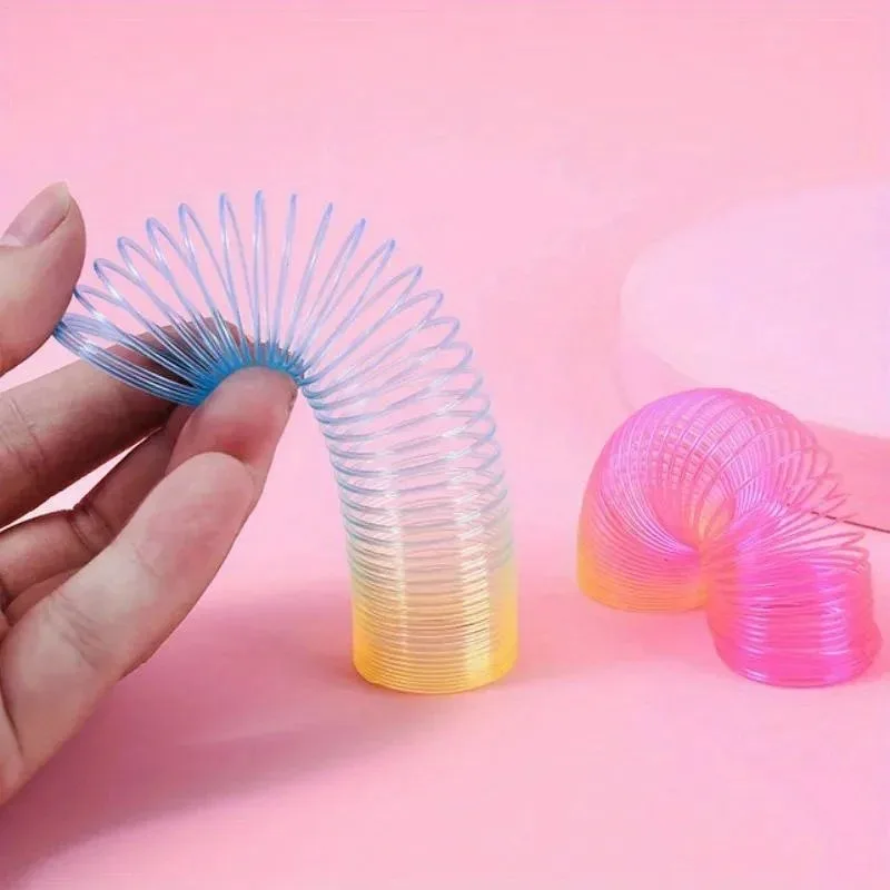 20 piezas Mini juguetes de resortes mágicos de arcoíris para niños, recuerdo de fiesta de cumpleaños, regalos, recuerdo, relleno de piñata para invitados de guardería