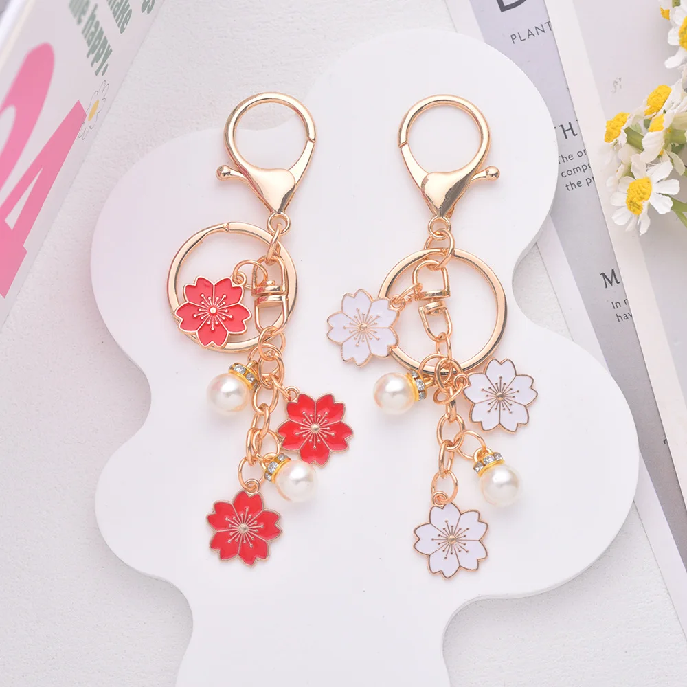 

Handmade falling cherry blossom keychain oil dripping bag pendant for female girlfriends, couple pearl pendant accessories