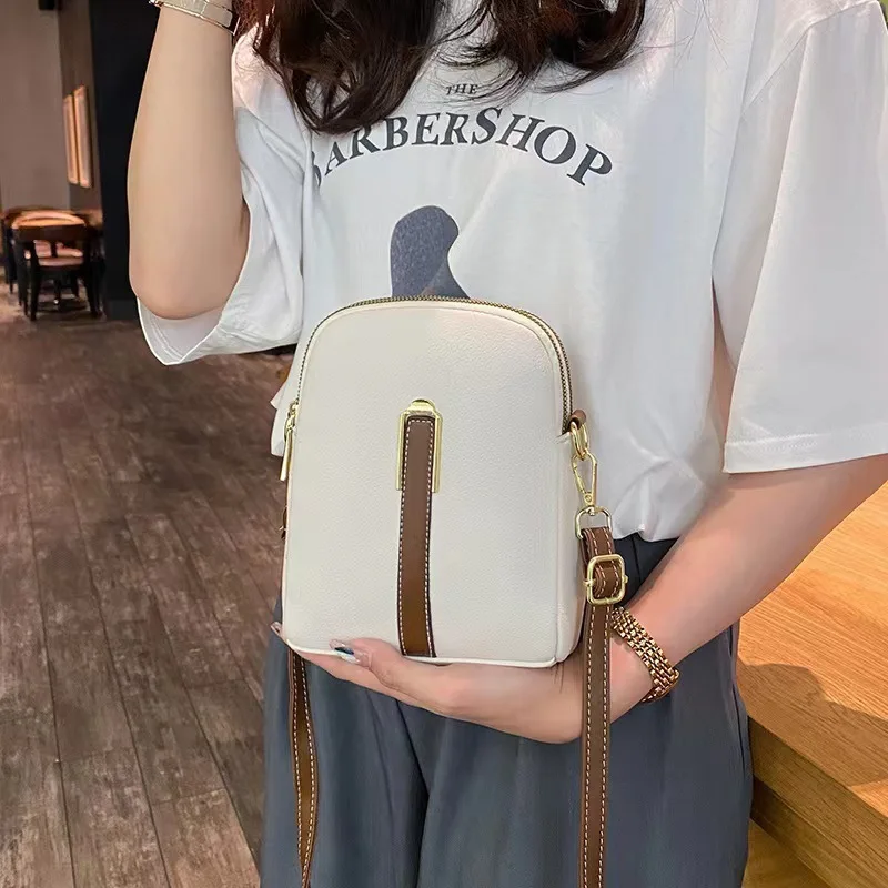 Crossbody bag women\'s new autumn and winter Japan and South Korea PU soft vertical solid color personality design with headphone