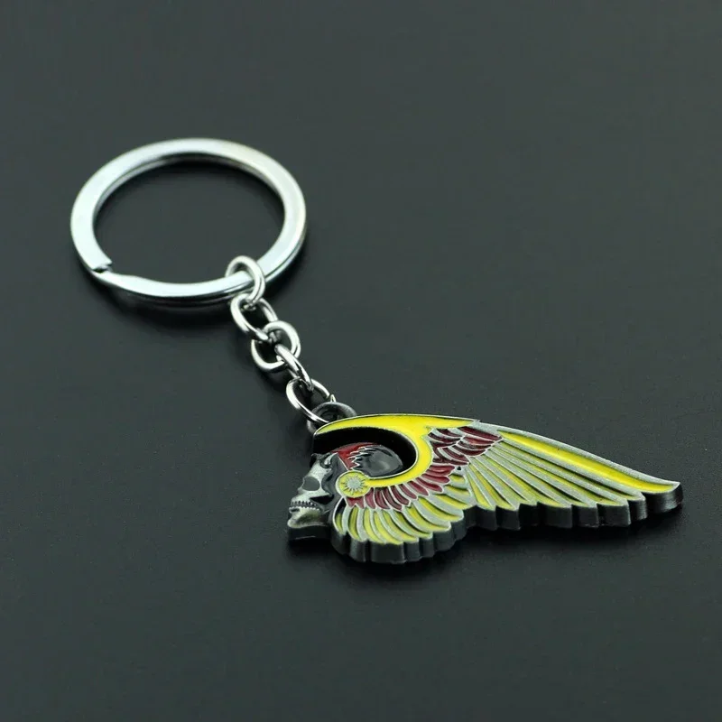 Outlaws Hot sales New Arrival Skeleton Wing Motorcycle Biker Clothing Hells Angels Pins Man Party Rock Key chain Gift