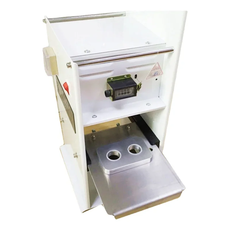 

Small coffee capsule sealing machine with two/four/nine heads