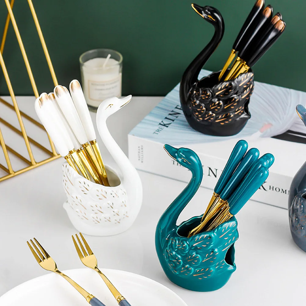 مجموعة واحدة من شوك الفاكهة المصنوعة من الفولاذ المقاوم للصدأ وحاوية تخزين سيراميك أنيقة على شكل بجعة للمقهى المنزلي