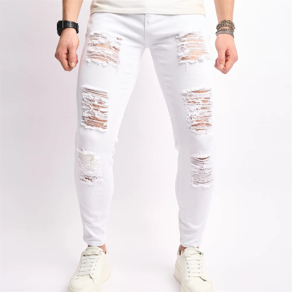 Eleganti fori Distressed Street Style uomo Jeans Skinny pantaloni Slim elasticizzati maschili pantaloni in Denim a matita strappati solidi