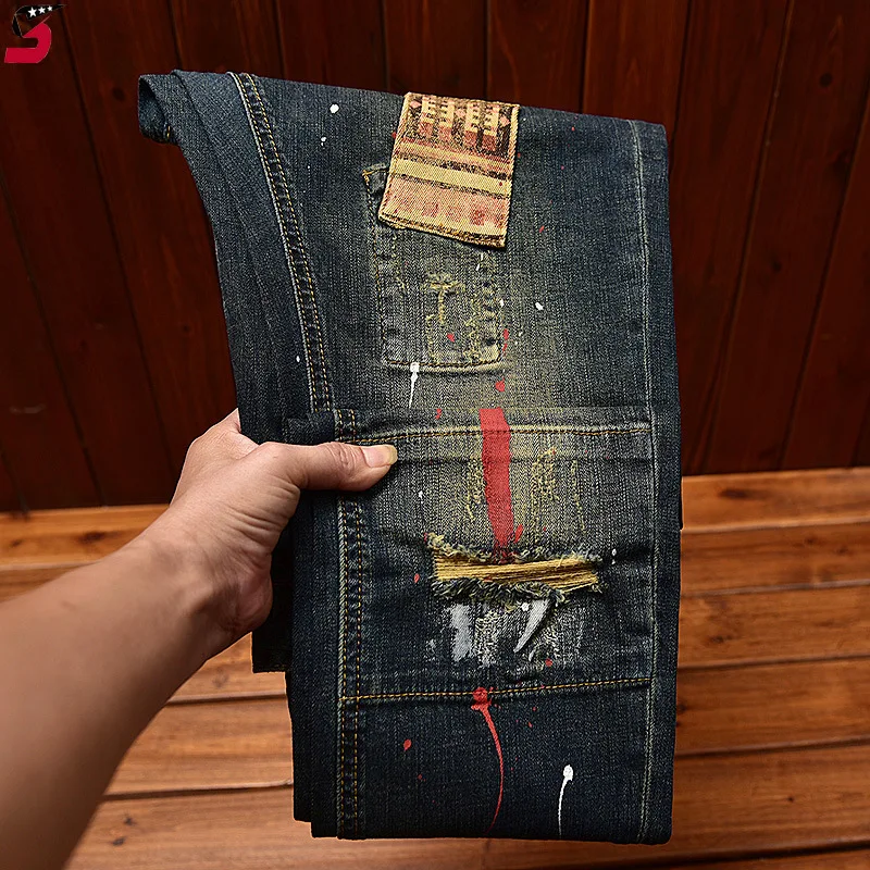 Celana jeans Motor pria, celana panjang retro tampan, jalanan, ketat, melar, cetakan grafiti, LUBANG & tambalan, modis jahitan