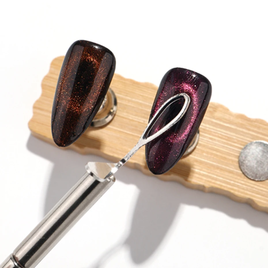 Strumento ausiliario per forchetta in ferro con effetto occhio di gatto cavo magnetico Cat Eye con foro nero per strumenti per accessori magnetici per smalto fai da te per nail art
