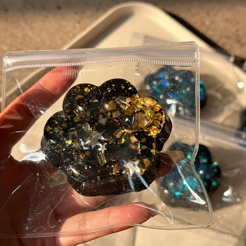 Juguete relajante blando con forma de pata de gato de galaxia: diseño de brillo azul translúcido y negro de crecimiento lento, divertido recuerdo de fiesta o regalo de cumpleaños para Gi