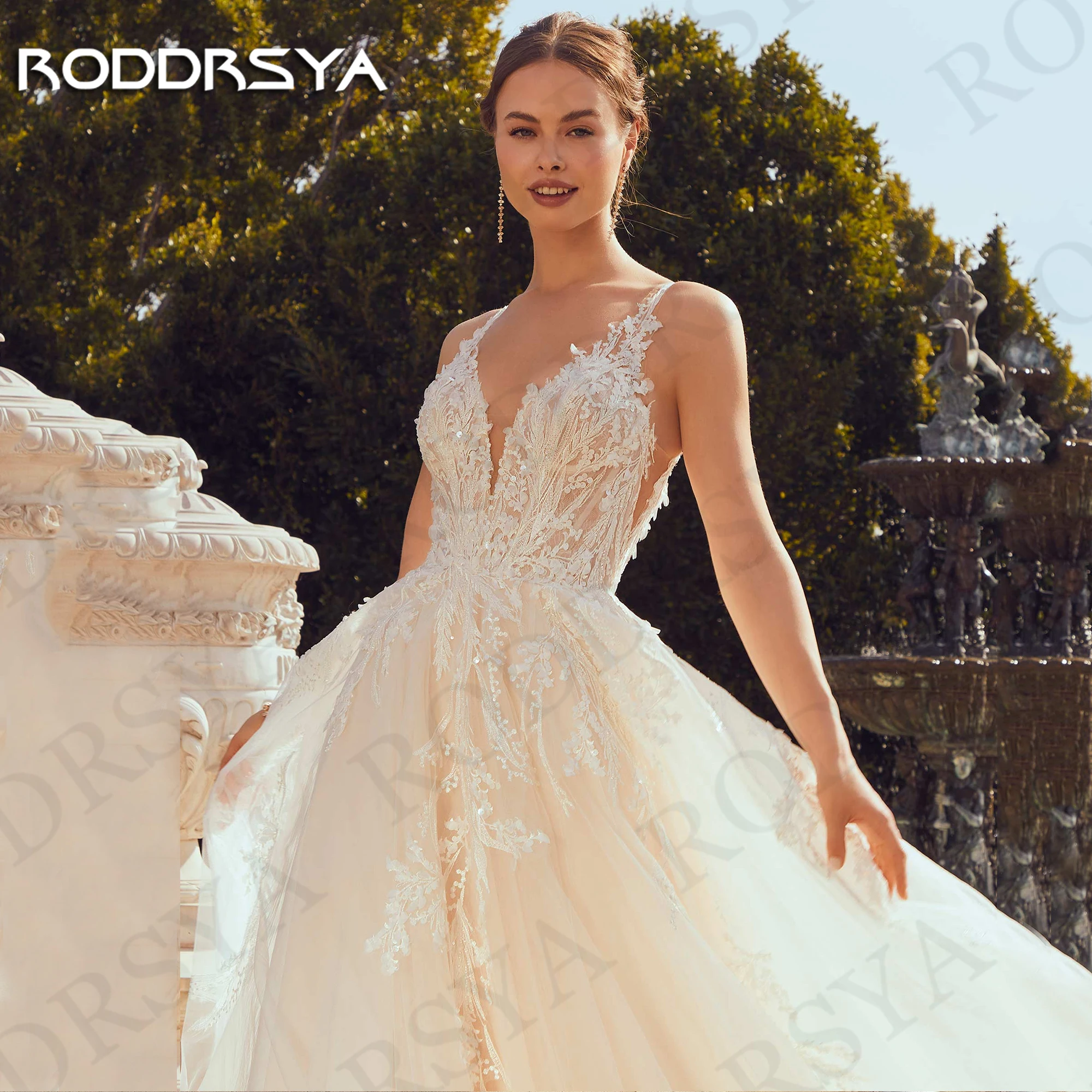 RODDRSYA Luxe Trouwjurk 2025 A Line robe de mariée Lace Illusion Back Tulle Bruidsjurk Mouwloze V-hals Aangepaste Vrouw Luxe Bruidsjurk 2025 A Lijn Kant Illusie Terug Tule Bruidsjurk Mouwloos V-hals Aangepaste Vrouw