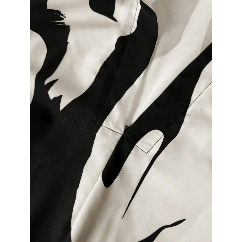 Long-Sleeved Jumpsuit, Made of Patchwork Fabric, Featuring a Loose Printed Shirt Combined with Solid Elastic Material view 6