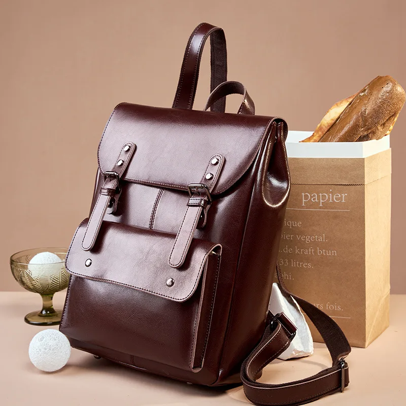Genuine leather flip-top lock backpack, large-capacity, retro waterproof high-end travel computer backpack