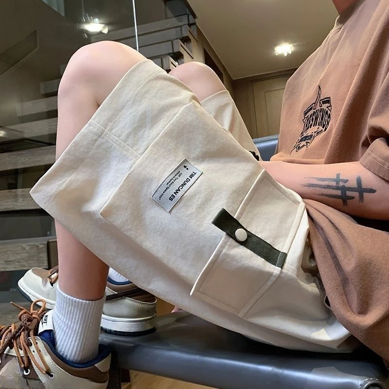 กางเกงขาสั้นสําหรับชายสีเขียวBaggyยืดหยุ่นเอวMens Half Cargoกางเกงขาสั้นStreetwearเสื้อผ้าElegantสบาย 2025 แฟชั่น