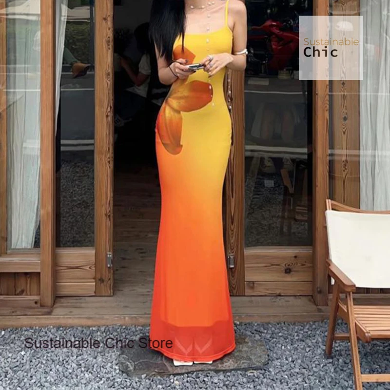 

French spice girl temperament smudge print halter dress female summer new fashion sexy slim leisure waist fishtail dress.