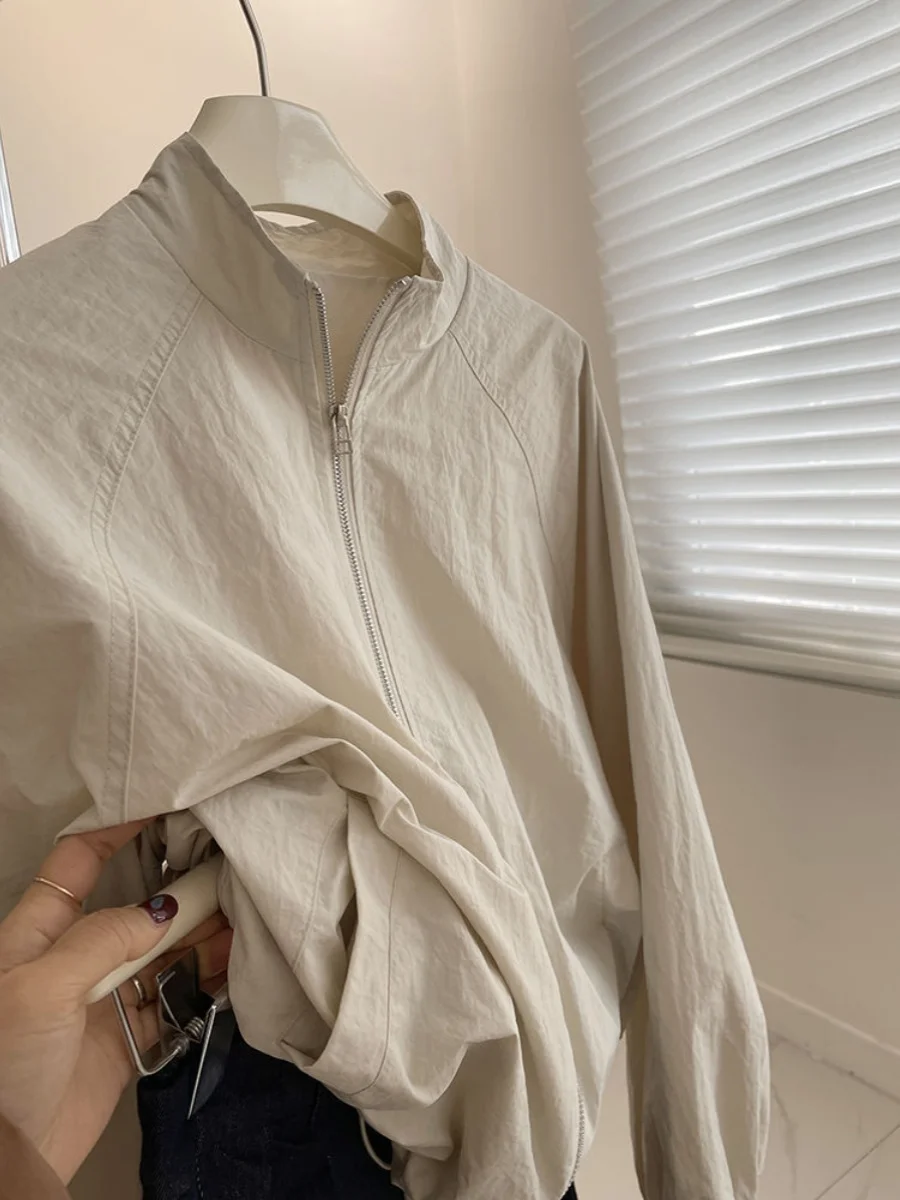 سترة قصيرة بياقة عالية على الطراز الكوري للنساء، متعددة الاستخدامات للربيع، نحيفة وعملية، خفيفة الوزن مع سحاب، واقية من الريا... #1