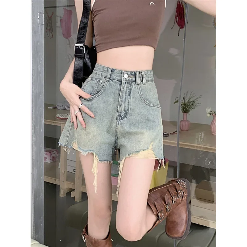 2025 été nouveau Style Vintage taille haute Holey a-ligne Denim Shorts femmes cloche bas pantalons décontractés origine chinoise