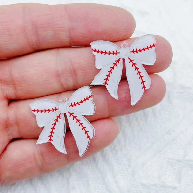 10 pieces of acrylic football rugby element bow pendant earrings necklace keychain DIY production process
