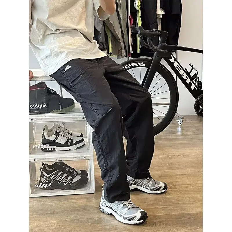 

Navy blue triangle logo pants men's summer thin quick drying waterproof assault pants straight leg outdoor sports work pants