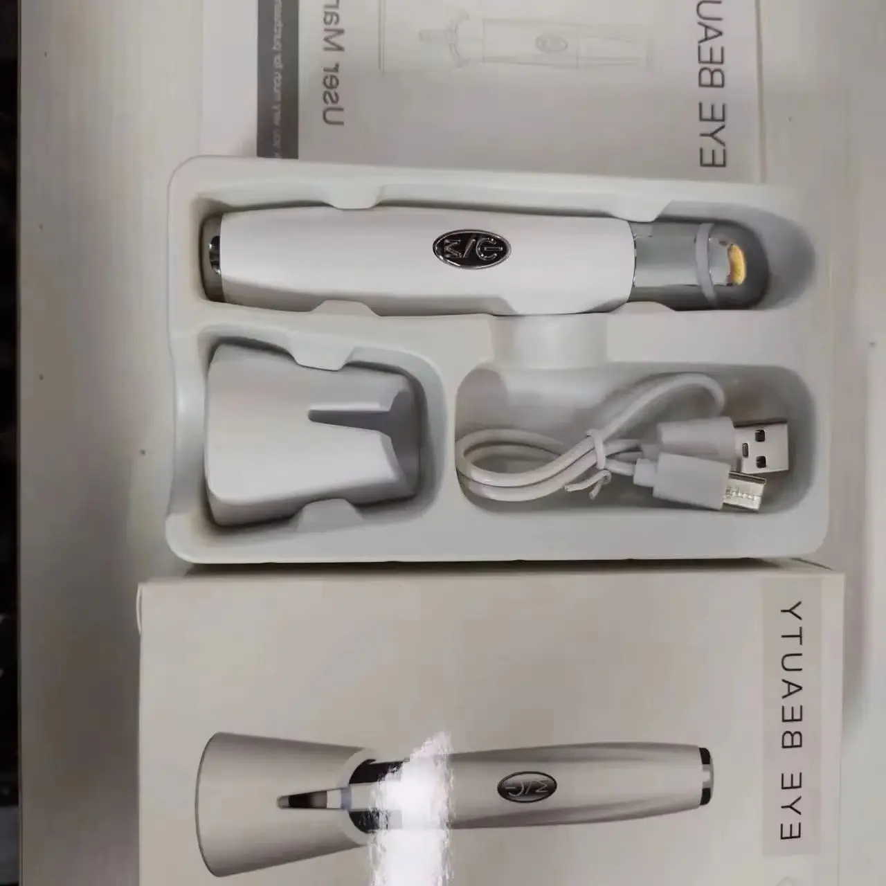 Masseur oculaire portable, baguette de levage des yeux, lumière LED, dispositif de beauté des yeux, outil de soins de la peau pour détendre les yeux, cernes, sac pour les poches