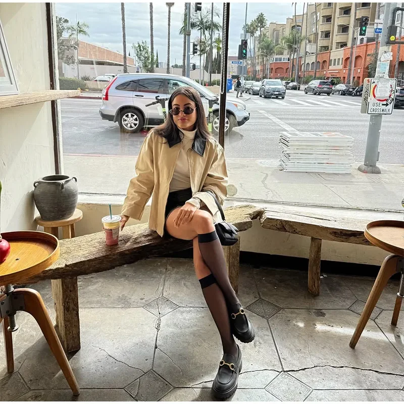 Cross border europeo e americano 2025 Autunno Nuovo prodotto Colletto in pelle PU allentata da donna Splicing Moda casual Top versatile